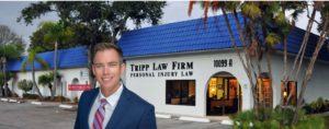 Personal Injury Attorney G. Alan Tripp Jr., Esq stands in front of Tripp Law Firm on a beautiful day in Pinellas County Florida
