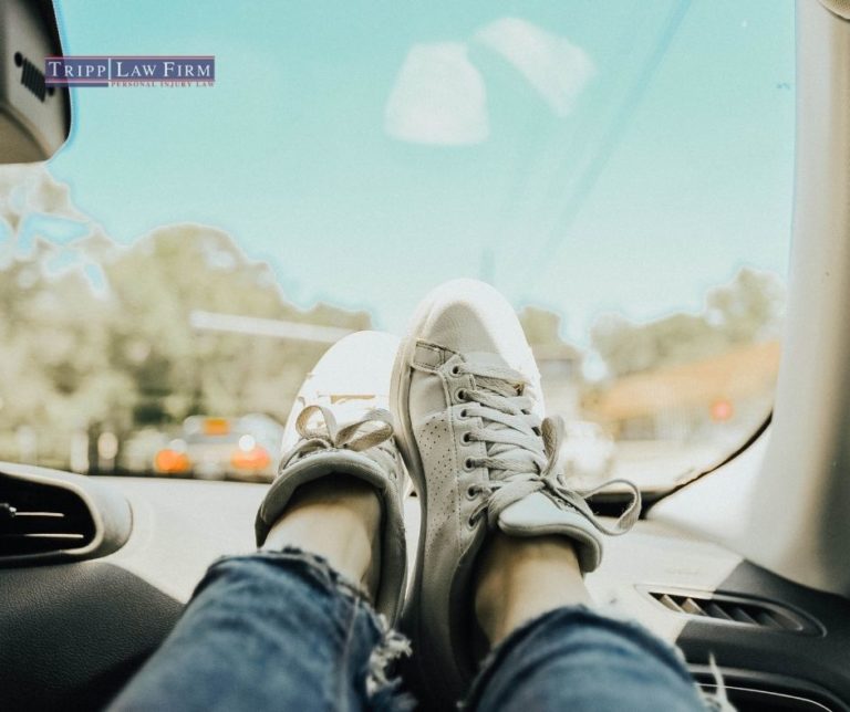 Feet up on the Dash Feet in a Gurney Tripp Law Firm